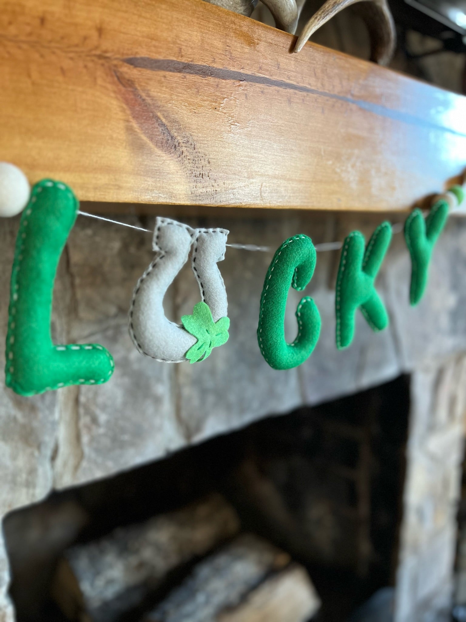 Felt hand sewn letters and garland.  clover, green and gray