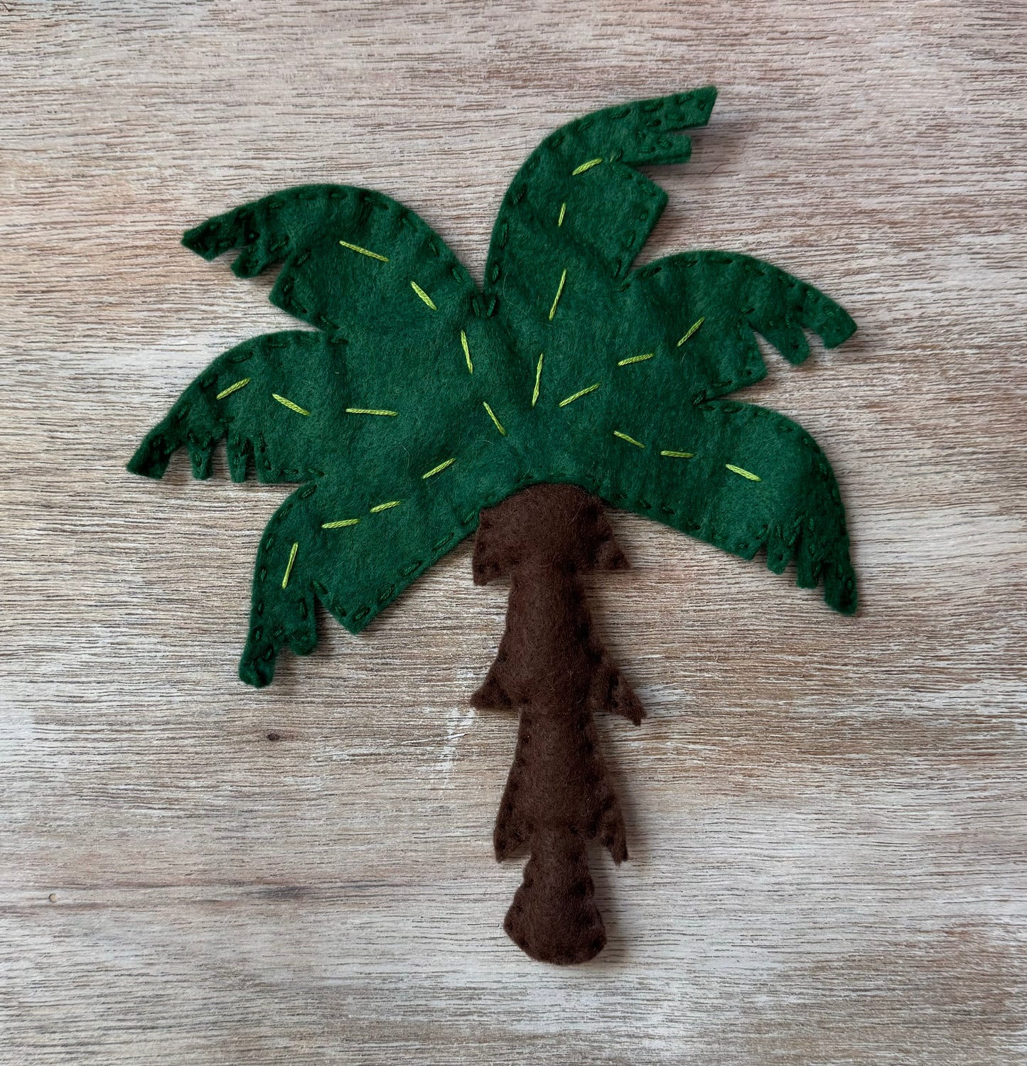 handmade and hand sewn felt creation by a little bit whimsy - brightly colors . primary colors and pastel palm tree