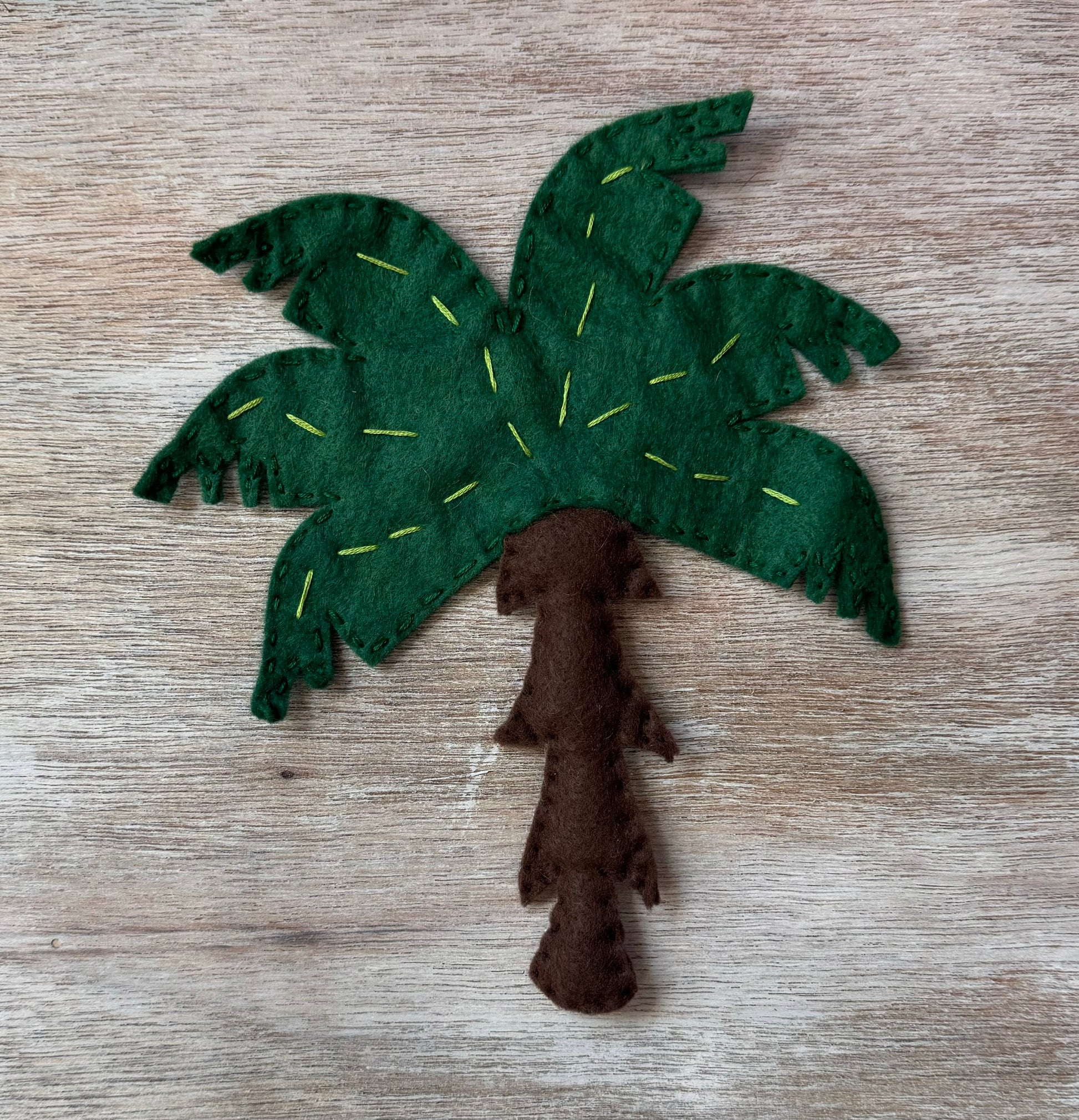 handmade and hand sewn felt creation by a little bit whimsy - brightly colors . primary colors and pastel palm tree